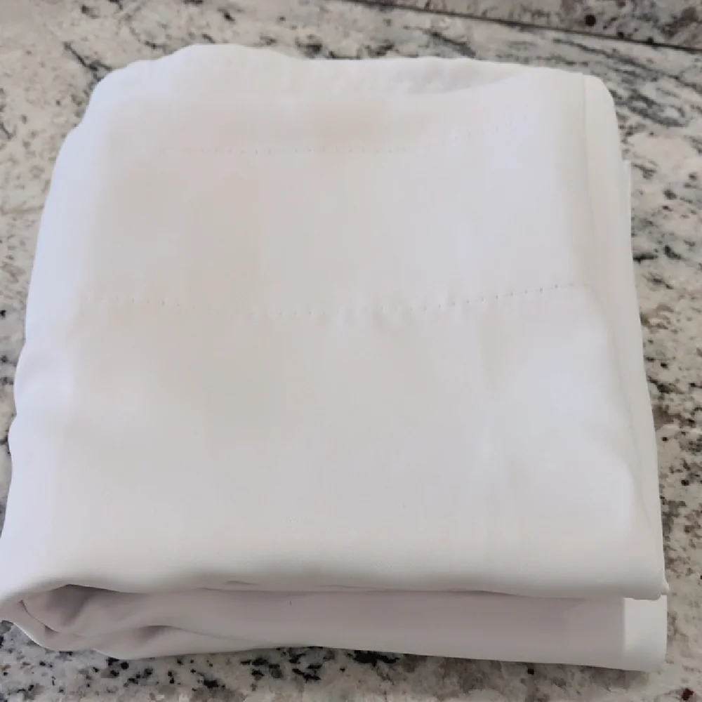 4 Curtain Panels. Never Used